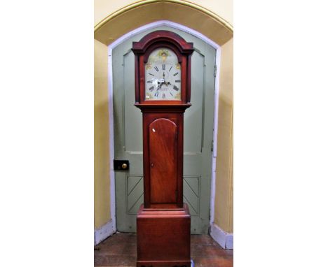 A Georgian mahogany longcase clock with broken arch painted dial, eight day striking movement, subsidiary and calendar dials 