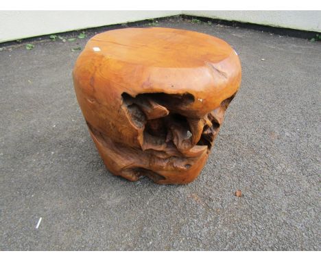 A rustic wooden stool /low occasional table formed from a single piece of tree trunk 40 cm high x 43 cm diameter 