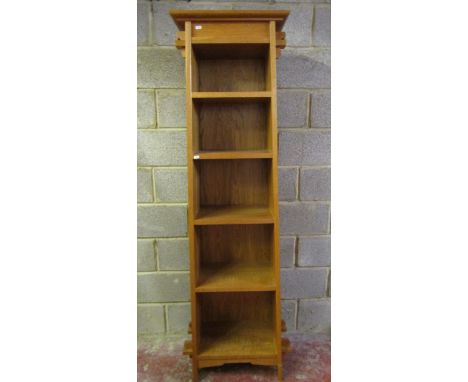 A good quality contemporary light oak freestanding open bookcase in the Arts &amp; Crafts style with thick shelves and pegged