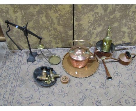 Antique brass and copper wares to include beam scales, copper kettle, watering can, saucepan, a brass roasting jack, beam sca