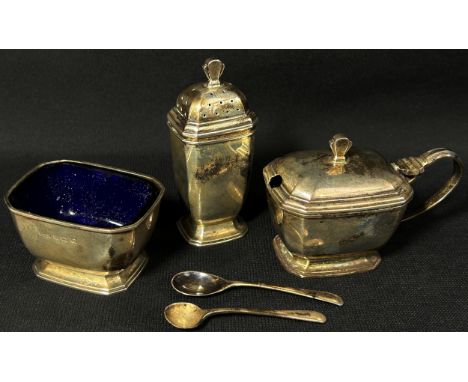 A cased silver sugar bowl, jug and tong, a cased condiment set, a ladle, salt and pepper pots, a cased set of six teaspoons, 