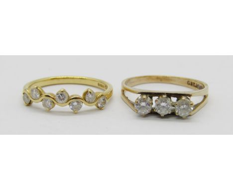 18ct seven stone diamond ring of wavy form, 0.35ct total approx, maker 'MJM', Sheffield 1989 import marks, size M/N, 2.4g and