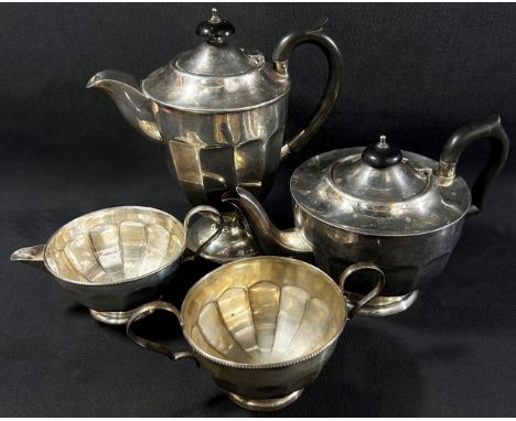 A four piece silver tea service, teapot, coffee pot, sugar bowl and milk jug Sheffield 1938 maker’s Viner’s Ltd, 34.2 oz appr