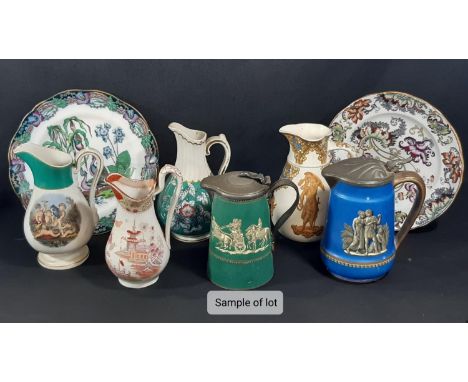 A collection of 9th century Prattware and other pieces comprising several jugs, ironstone plates, Carltonware dish with fruit
