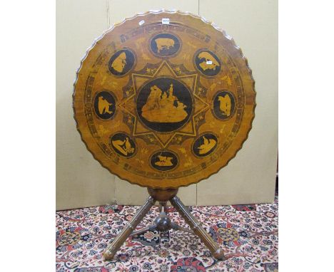 Mid 19th century walnut, marquetry and painted occasional table of Black Forest origin, fluted top enclosing eight oval panel