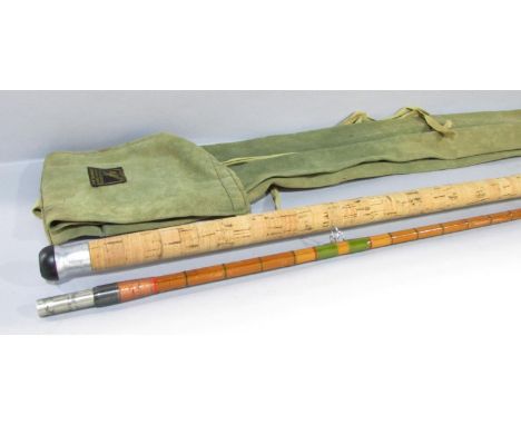 A Vintage Hardy’s 2 piece split cane No 2 L R H Spinning fishing rod with cloth bag and the reel fastening spanner, 270cm lon