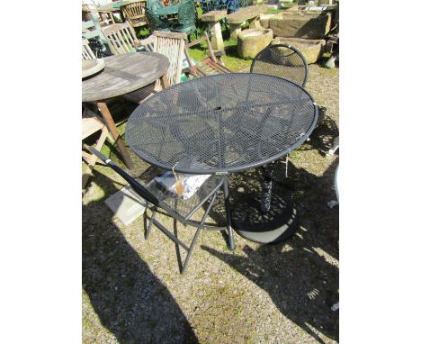 A contemporary Kettler coated light steel circular garden terrace table raised on swept supports, 110cm diameter, together wi