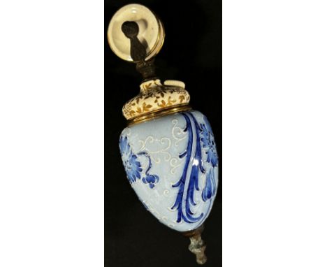 A Moorcroft ceramic counter balance from a rise and fall light decorated in a blue and white floral pattern, registered numbe