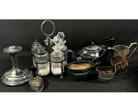 A mixed collection of silver plate including a vinaigrette stand with five condiments, a canker stand minus plate, a small te