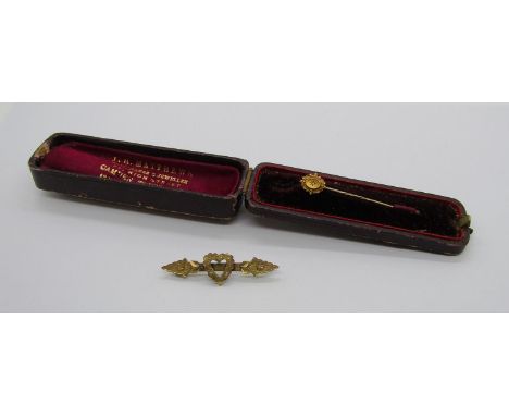Aesthetic Movement 9ct love heart bar brooch and a stick pin with 15ct rose-cut diamond set head, contained in a period case 