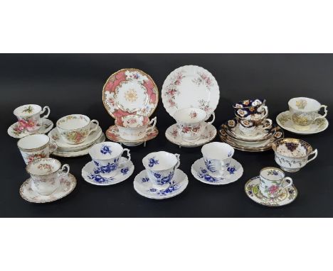 A group of mixed porcelain cups and saucers, 19th century and later, to include a Royal Worcester example with hand painted f