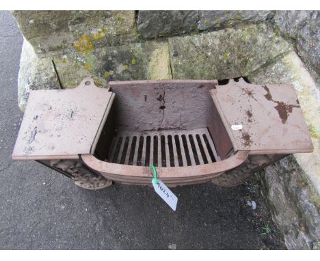 A 19th century cast iron hob grate with bow fronted basket and raised relief foliate detail,  45 cm high x 70 cm x 26 cm (af 