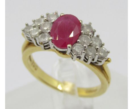 18ct oval ruby and stepped diamond cluster cocktail ring, maker 'CJW', Sheffield, size N/O, 6.4g 