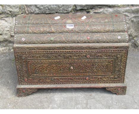 A small decorative Burmese hardwood trunk with applied scrawling borders and insert bead, decoration, 38 cm high, 53 x 27 cm.