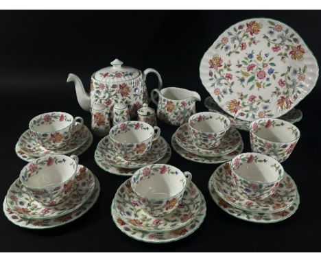 A quantity of Minton's Haddon Hall pattern tea wares comprising teapot, milk jug, sugar basin, cake plate, sandwich plates, s