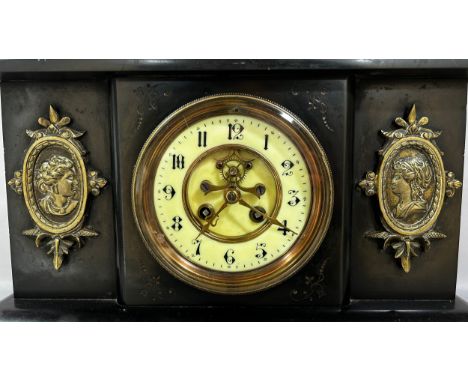 A Victorian black slate cased mantle clock, 31cm high, 38cm wide. 
