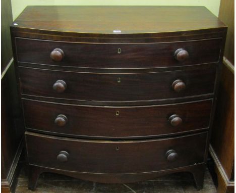 A Georgian mahogany bow front caddy top chest of four long graduated drawers on swept supports, 100 cm wide 