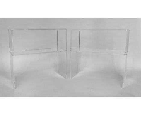 CONSOLE TABLES, a pair, late 20th century, lucite, each rectangular with shelf, 70cm W x 30cm D x 70cm H. (2) 