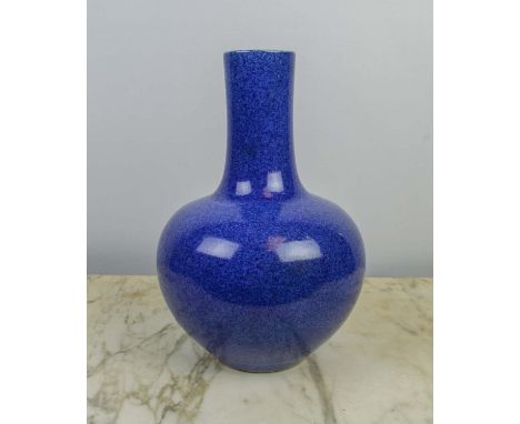 A CHINESE PORCELAIN POWER BLUE BOTTLE VASE, under glaze six character Kangxi mark, 35cm H. 