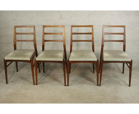 A set of four circa 1960s teak dining chairs, believed to be Richard Hornby for Fyne Lady, with ladder back design with drop-