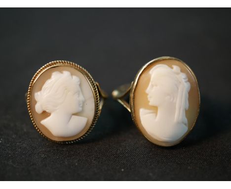 Two 9ct gold carved shell cameo dress rings, each of a classical female side portrait. One with a ring box. Ring sizes N 1/2 