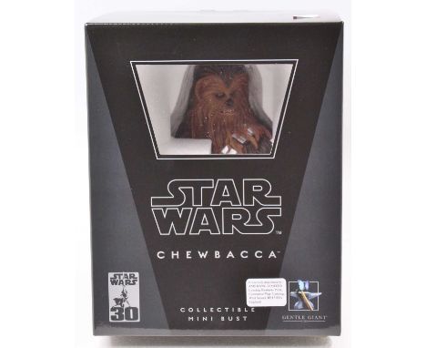 A Gentle Giant Ltd 1/6 scale model of a Star Wars Chewbacca collectable mini bust, housed in the original polystyrene packed 