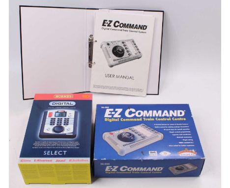 Two Digital Controllers with instructions (in binder): Hornby R8213-11-2365 and Bachmann E-Z Command ref 36-500. Both appear 