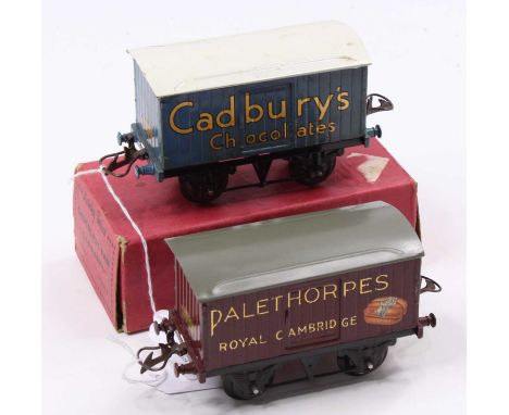 Two Hornby goods vans both with standard black bases: 1938-41 ‘Cadbury’s, lighter blue body, block letters, white roof (VG-E)