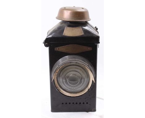 An LMS stamped Adlake No. 22 railway lamp with maker's mark and stamped LMS to top dome