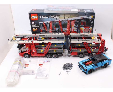 A Lego Technic No. 42098 made-up model of car transporter and load, sold with the original box, instruction leaflet, and a qu