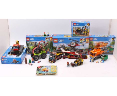 A collection of Lego City and Lego Creator boxed and constructed gift sets to include a No. 60181 Forest Tractor, No. 60183 S