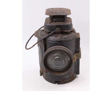 An Adlake LMS Railway signalman's hand lamp, 33cm with clear bulls eye lens and LMS plate to one side