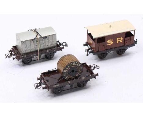 Three Hornby 4-wheeled Southern goods wagons: 1928-30 Brake van, lighter brown body, open axleguard base, large gold ‘SR’ doo