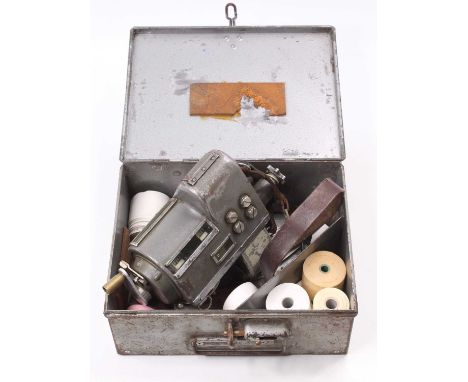 A tin cased bus or tram conductor's ticket machine by TIM housed in the original box