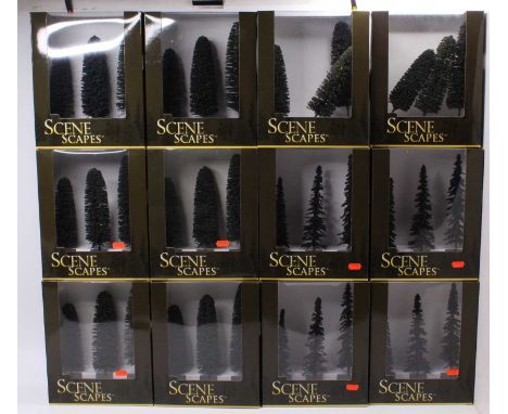 Twelve boxes Bachmann trees each containing three. Each unopened but boxes will benefit by cleaning