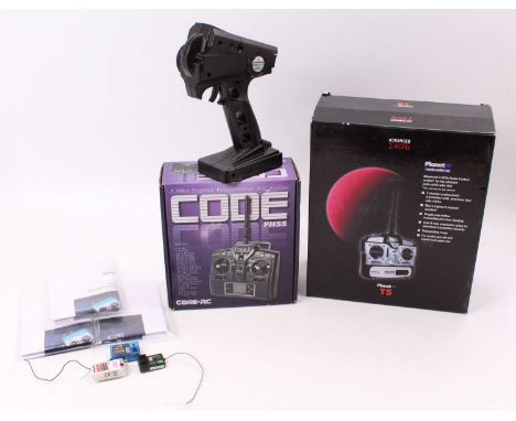 A boxed Planet T5 advanced 2.4GHz Radio Control Transmitter Unit, together with a boxed Core RC 2.4Ghz Digital Proportional R