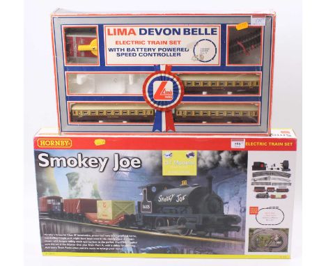 Two Train sets: Hornby R1036 ‘Smokey Joe’ with 0-4-0 tank loco of same name, 4 goods wagons, track &amp; controller (NM) (BE)