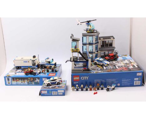 A collection of Lego City Police-themed construction kits, including No. 60141 large scale Police Station, No. 60239 Police c