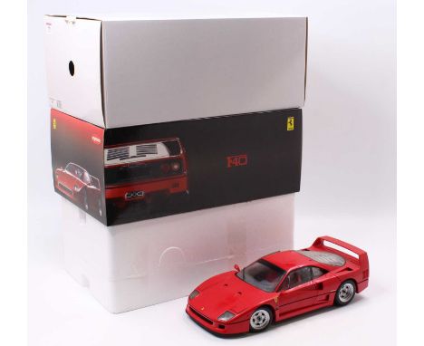 A Kyosho 1/12th scale No. 08602A Ferrari F40 finished in red, with a black interior, the model has been on display and would 