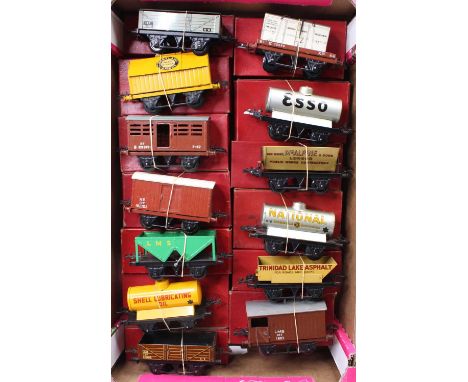 Thirteen post-war Hornby 0-gauge 4-wheeled goods wagons, boxed: BR open with sheet rail; cement; cattle; NE goods; LMS hopper