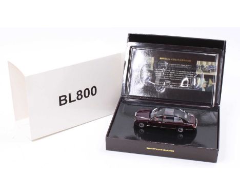 Minichamps 1/43 scale boxed model of a Bentley State Limousine finished in metallic maroon, housed in the original Bentley br
