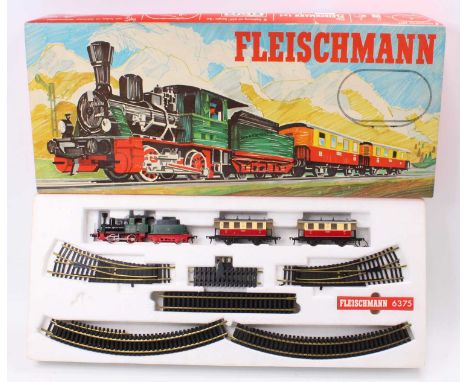 Fleischmann H0 passenger train set no.6375 comprising ‘old time’ 0-4-0 green &amp; red loco &amp; tender with two red &amp; c