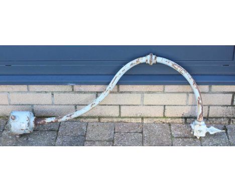 A cast iron possibly railway interest lamp arm, later adapted for electrical use rather than the original gas powered option,