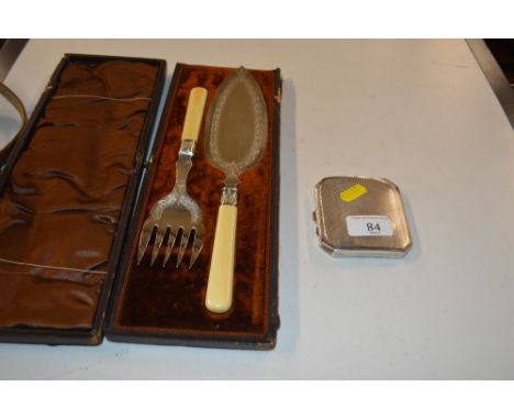 A silver cigarette case with engine turned decoration; and a pair of silver plated servers 