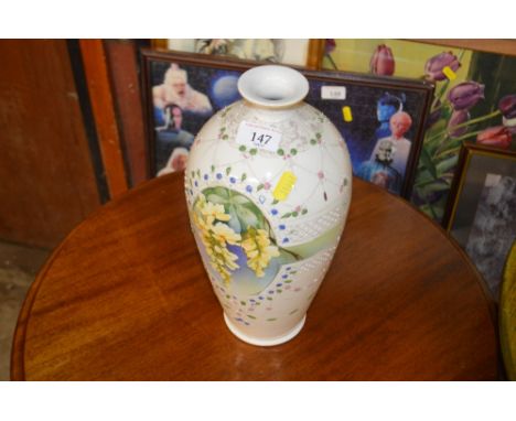 A Nippin floral decorated vase