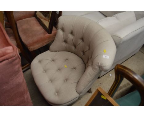 A modern button down chair 