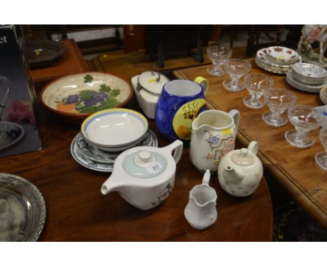 A quantity of various china and pottery to include and fruit decorated bowl, jugs, teapot etc. 