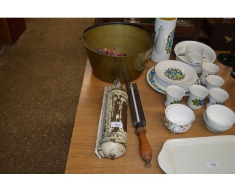A brass preserve pan; a thermometer; and a fire extinguisher 