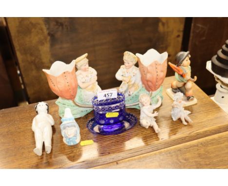 A pair of bisque porcelain figure posy holders, a Royal Worcester candle snuffer, various other figures etc. 