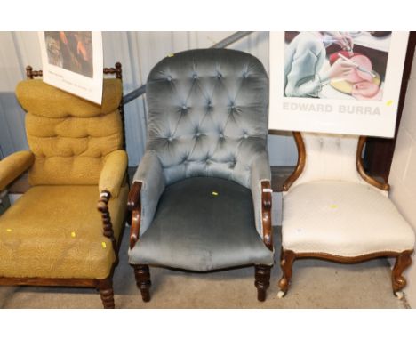 A Victorian mahogany framed and button back armchair